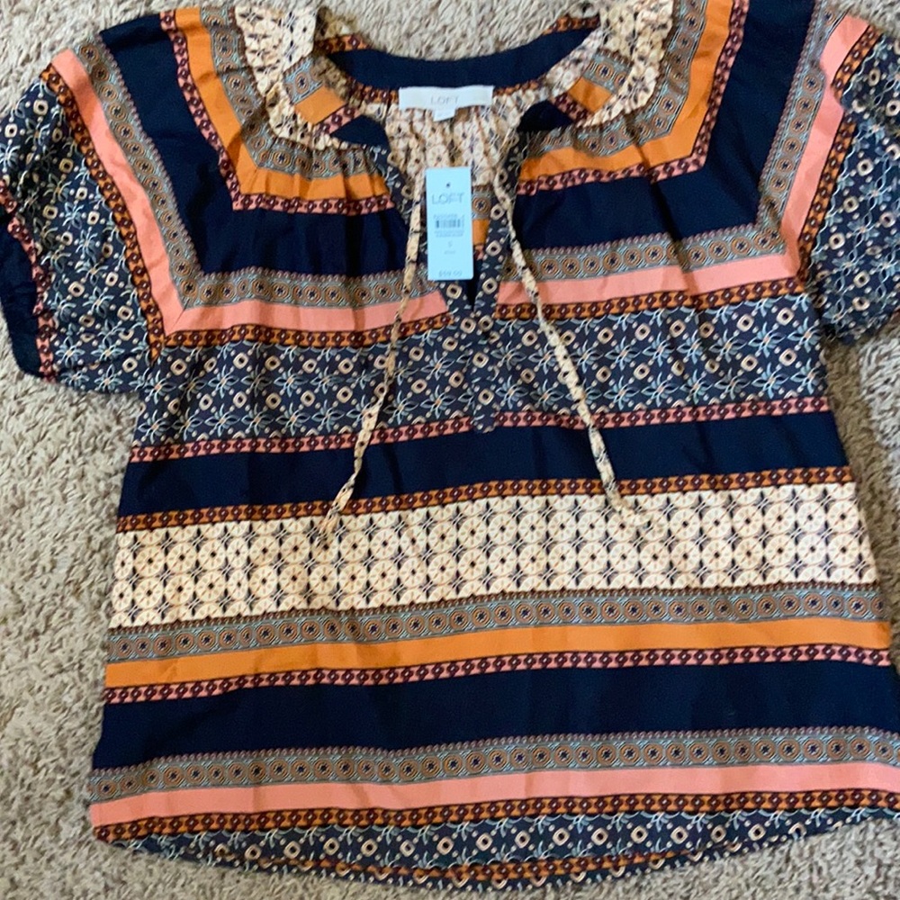 Brand new, never worn. Tags still on.